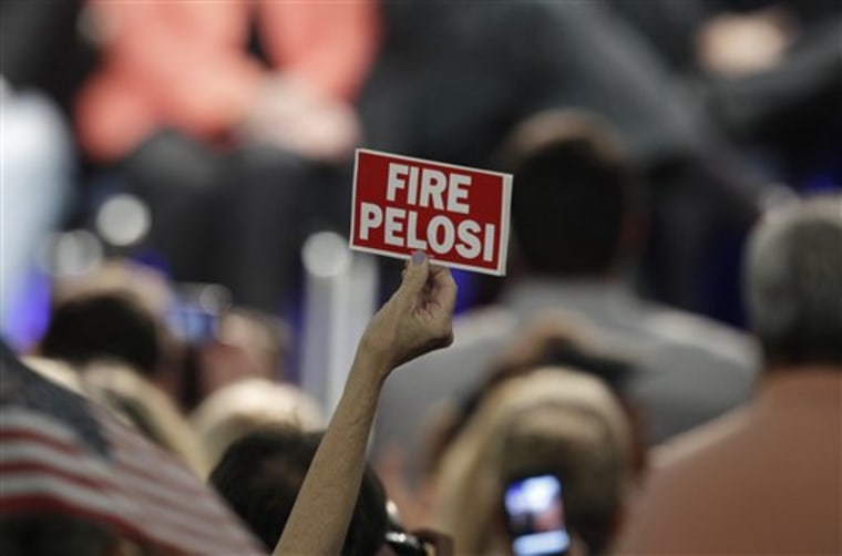 A woman holds up a sign while listening to former Alaska Gov. Sarah Palin during a Victory 2010 rally in Anaheim, Calif., Saturday.